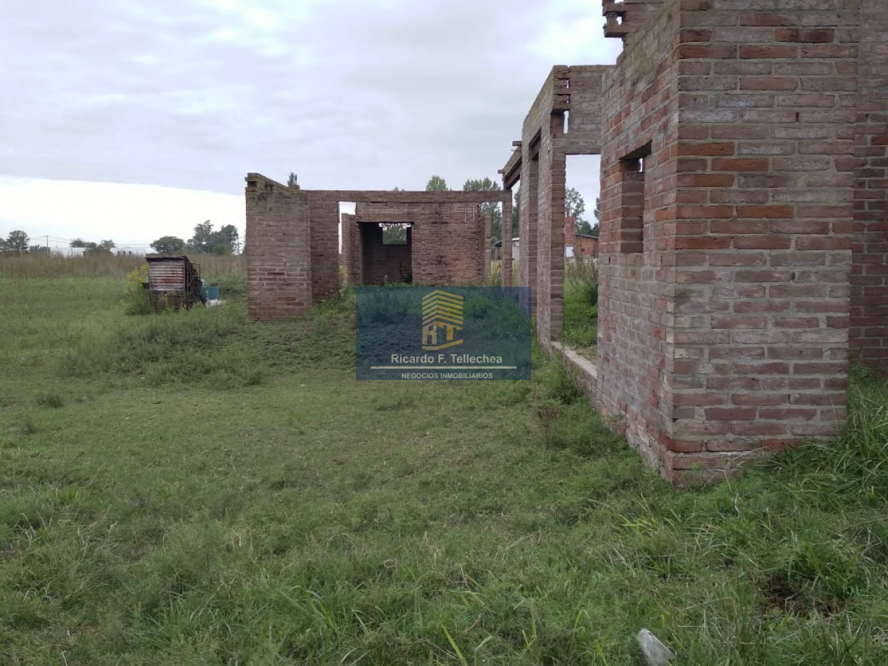 LOTE CON CASA A CONSTRUIR