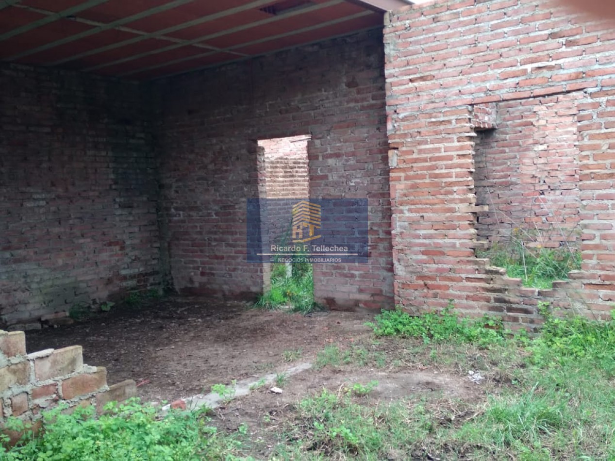 LOTE CON CASA A CONSTRUIR