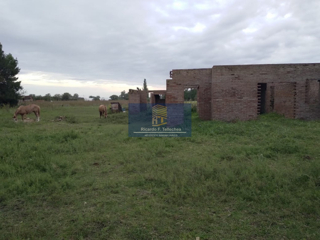 LOTE CON CASA A CONSTRUIR
