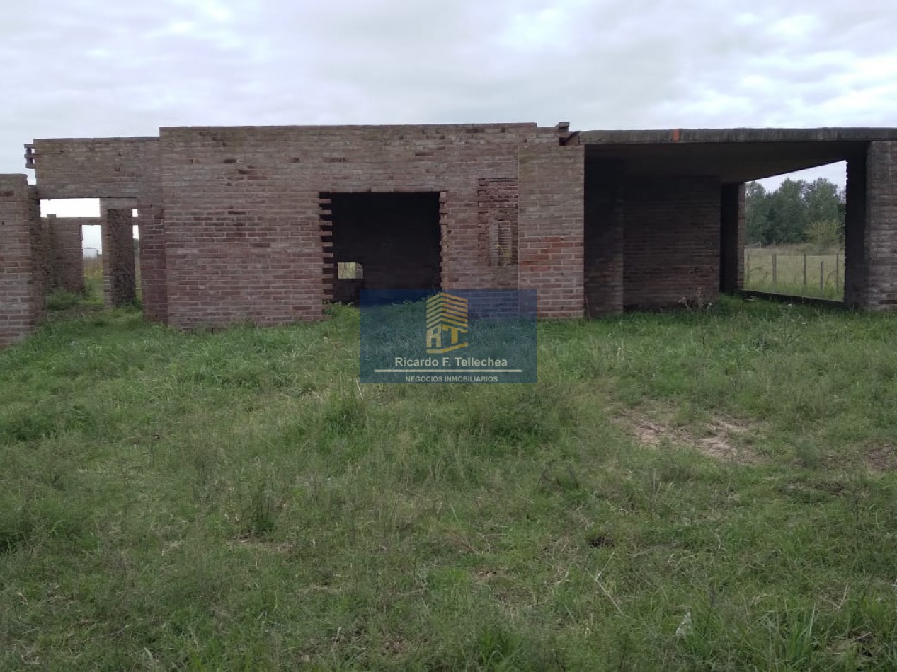 LOTE CON CASA A CONSTRUIR