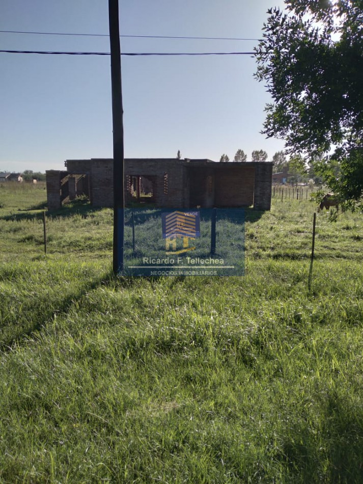 LOTE CON CASA A CONSTRUIR
