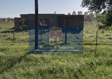 LOTE CON CASA A CONSTRUIR